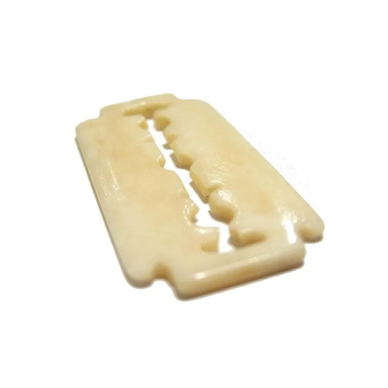 A Non-Hazardous Safety Razor Blade Hand Carved Cow Bone Pendant