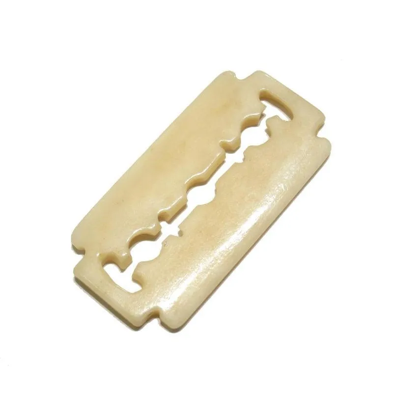 A Non-Hazardous Safety Razor Blade Hand Carved Cow Bone Pendant