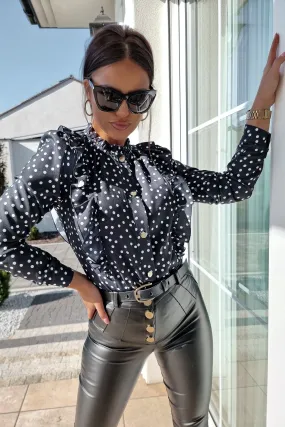 Camicia nera a stampa pois bianchi con rouches e bottoni dorati